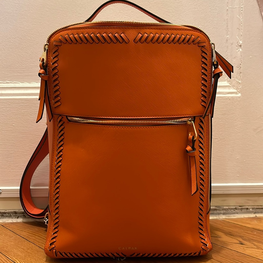 Kaya 15” laptop backpack in Papaya. Excellent preowned condition.